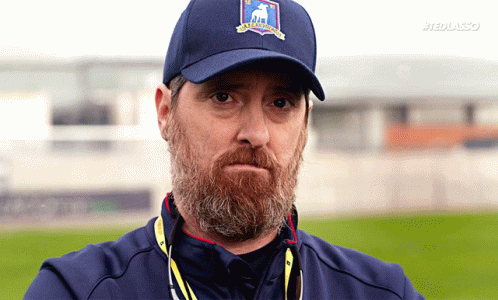 Man with Beard Wearing US Open Hat