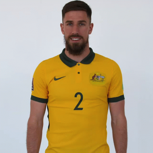 Man With Beard Wearing Yellow Shirt Saying Australia GIF