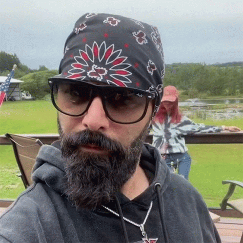 Man With Beard Wears Sunglasses and Bandana