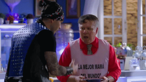 Man With Bib Saying La Mejor Mama GIF