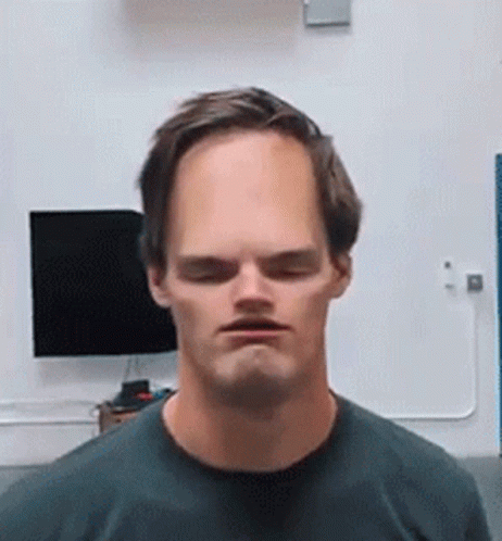 Man With Big Head Making Funny Face