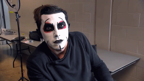 Man with Black and White Face Paint