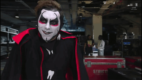 Man with Black and White Face Paint