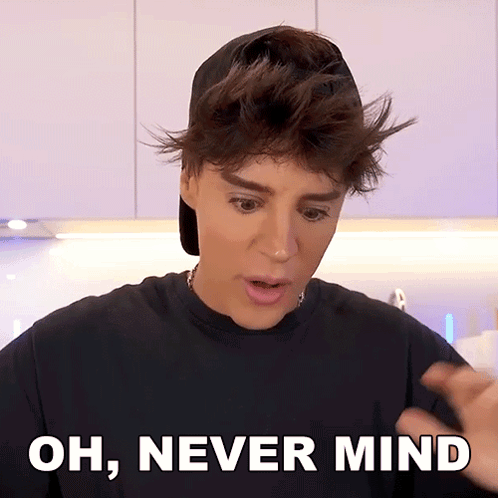 Man With Black Hat and Black Shirt Saying Oh Never Mind