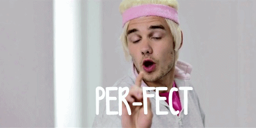 Man with Blonde Hair and Pink Headband Making Funny Face