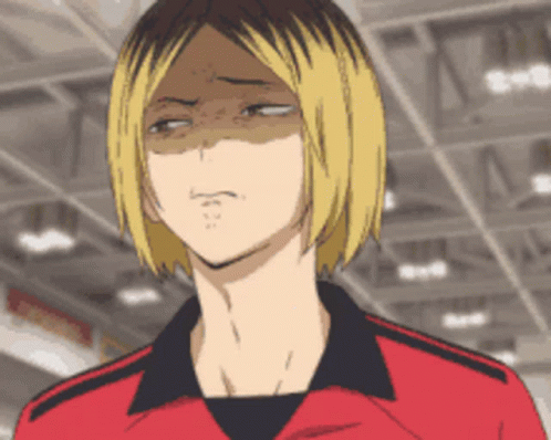 Man with Blonde Hair in Red Shirt Making Funny Face