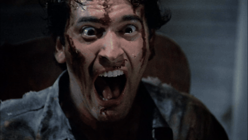 Man With Blood on Face Screaming