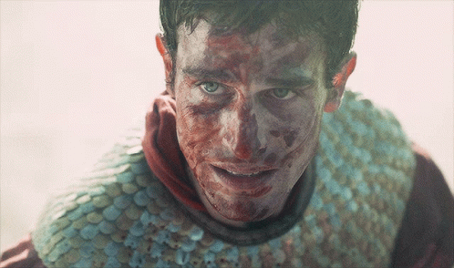 Man With Blood on Face Wearing Armor