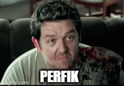 Man With Bloody Arm And Perfik On Couch GIF
