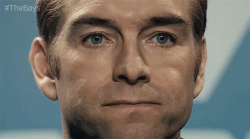 Man With Blue Eyes And Serious Expression GIF