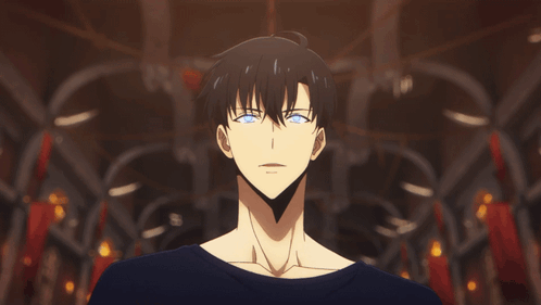 Man with Blue Eyes in Dark Room