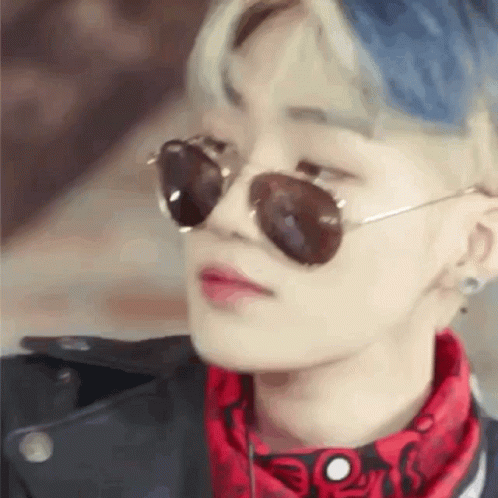 Man with Blue Hair and Sunglasses