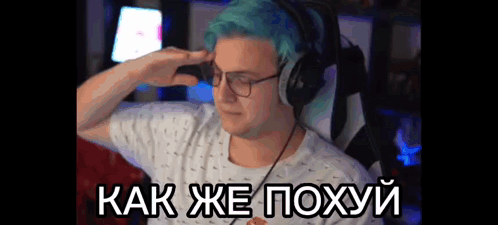 Man With Blue Hair Glasses and Headphones Saluting