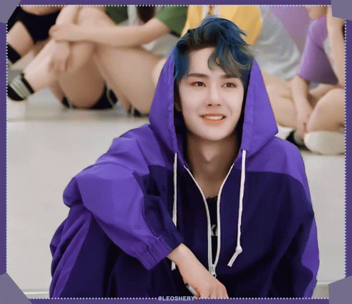 Man With Blue Hair In Purple Hoodie Smiling GIF