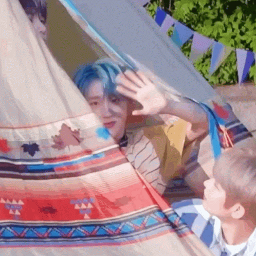 Man with Blue Hair in Tent