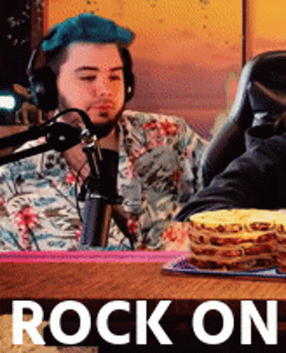 Man with Blue Hair Singing Rock On