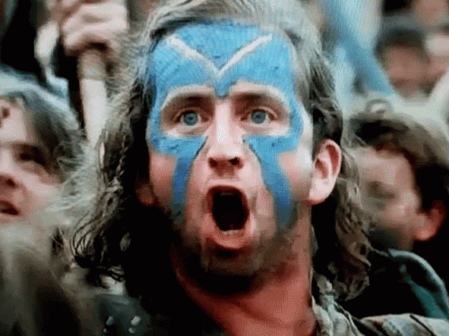 Man With Blue Paint Making Funny Face GIF