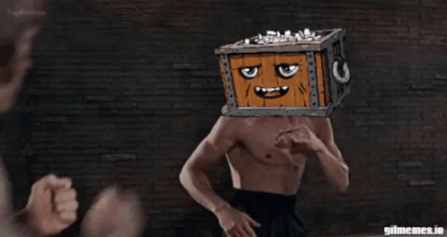 Man With Box on Head Being Punched