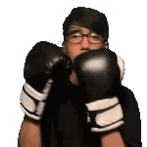 Man with Boxing Gloves Covering Eyes