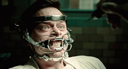 Man With Brace On Face Getting Drilled GIF
