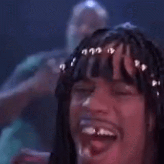 Man With Braids Making Funny Face Tongue Out