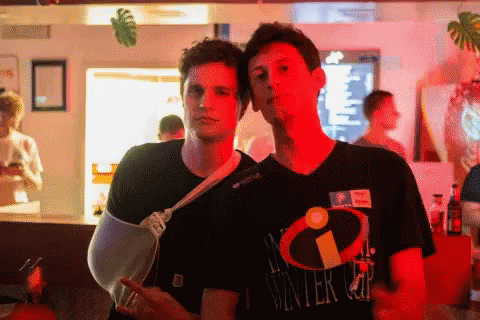 Man With Broken Arm Beside Winter Cup Shirt