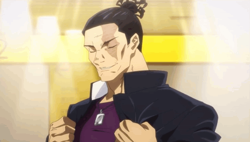 Man with Bun Wearing Jacket and Necklace