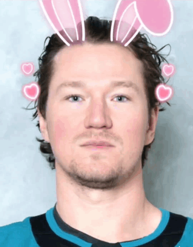 Man With Bunny Ears and Pink Hearts