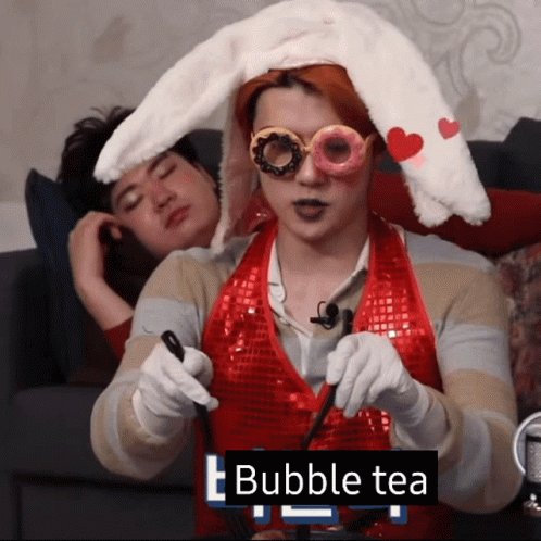 Man with Bunny Ears Holding Bubble Tea