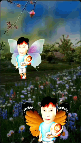 Man With Butterfly Wings Holding Baby GIF