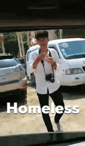 Man With Camera In Front Of White Van Number 12 GIF