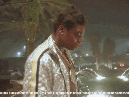 Man With Caption Midak Black Realizes Cole Discography Better