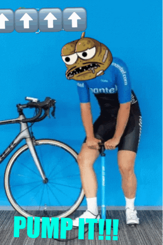 Man With Cartoon Face Pumping Bicycle Tire GIF