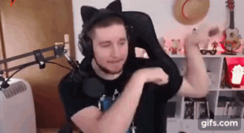 Man With Cat Ear Headset At Microphone GIF