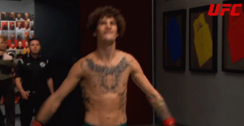 Man With Chest Tattoo and UFC Logo