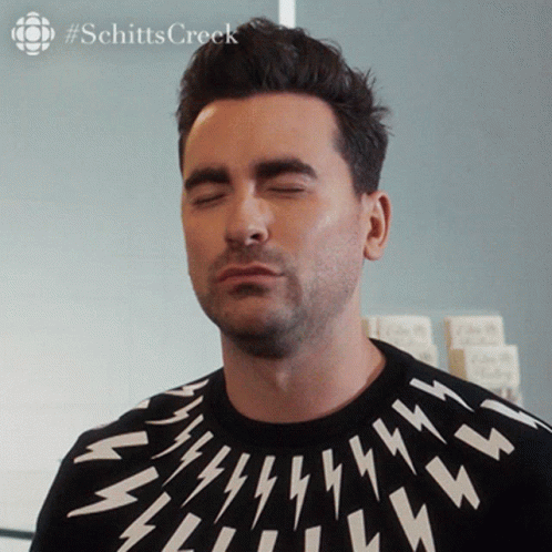 Man With Closed Eyes in Black and White Lightning Sweater