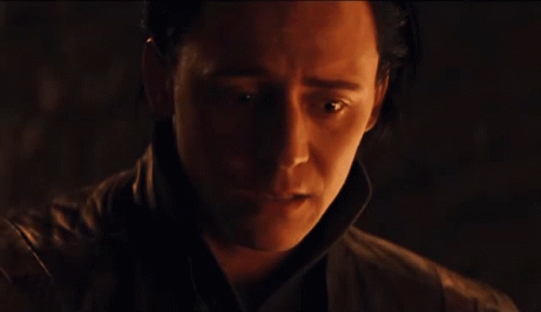 Man With Closed Eyes In Dark Room GIF