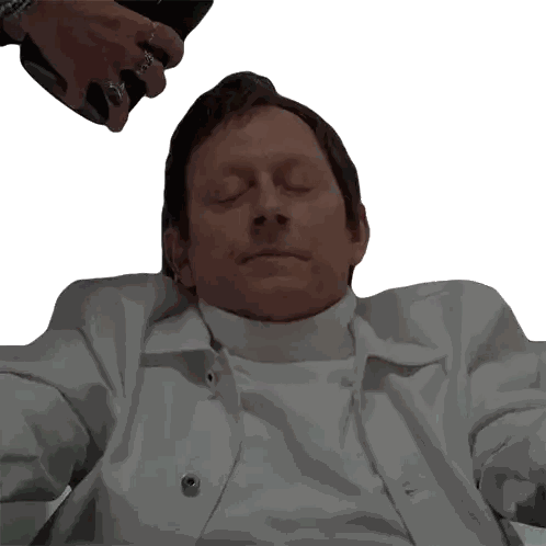 Man With Closed Eyes In White Turtleneck