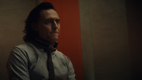 Man With Collar In Front Of Good Riddance Sign GIF