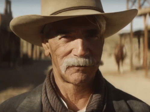 Man with Cowboy Hat and Mustache