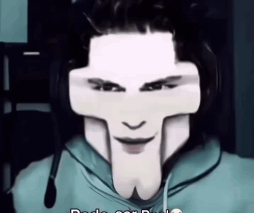 Man With Cross on Face Wearing Headphones and Blue Hoodie