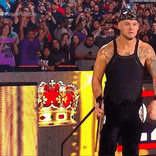 Man With Crown Facing Crowd #RoyalRumble GIF