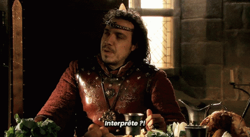 Man with Crown Saying Interprete