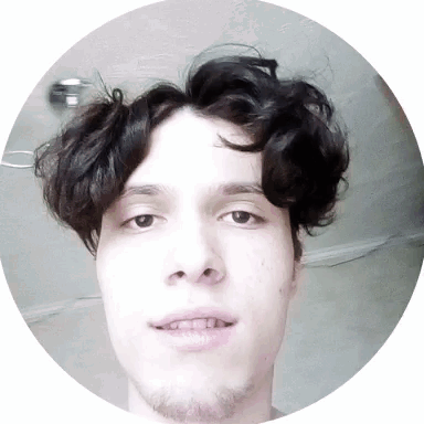 Man with Curly Hair and Beard in Circle