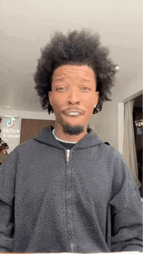 Man With Curly Hair And Beard Making Funny Face GIF
