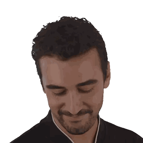 Man with Curly Hair and Beard Smiling