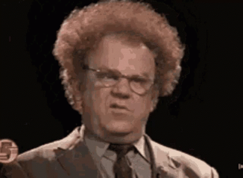 Man With Curly Hair And Glasses Making Funny Face GIF