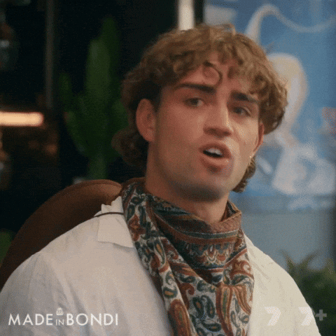 Man with Curly Hair and Scarf