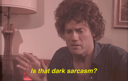 Man with Curly Hair Asking If That Dark Sarcasm