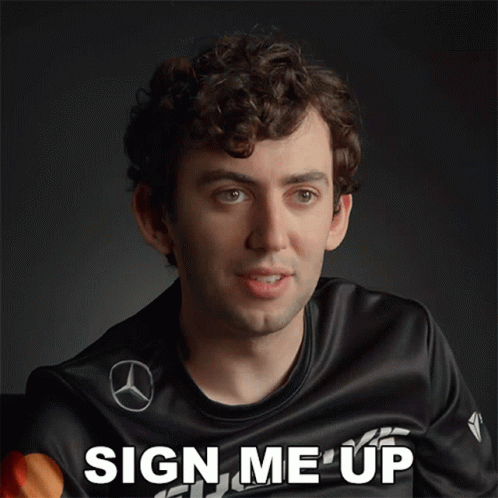 Man with Curly Hair in Sign Me Up Shirt